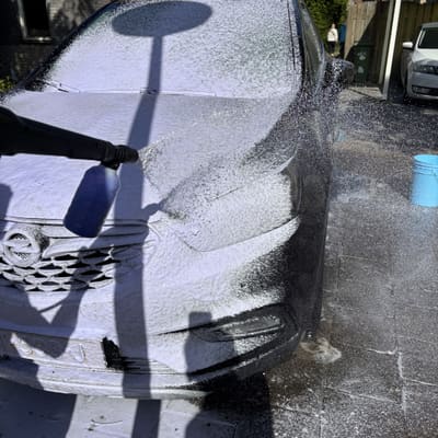 Snow foam over auto